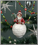 Santa Claus in a Snowball cotton batting Christmas ornament from the Blumchen atelier