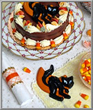 Halloween black cat on orange crescent moon plastic cake plaques