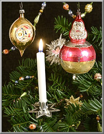 Christmas tree decorated using star candle clips