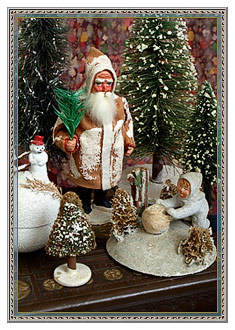 Vintage Christmas decorations with mica flake snowy accents
